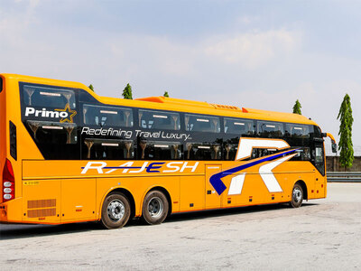 Rajesh orange Volvo 9600 coach side view